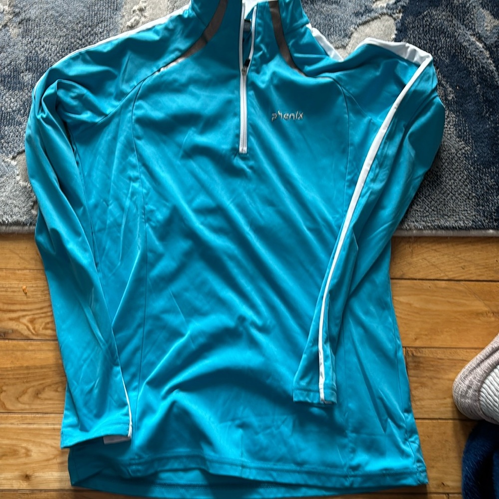 Like New Phenix 1/4 long sleeved golf/ cycling long sleeved shirt